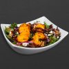 Chicken kebab on kebab bar salad.